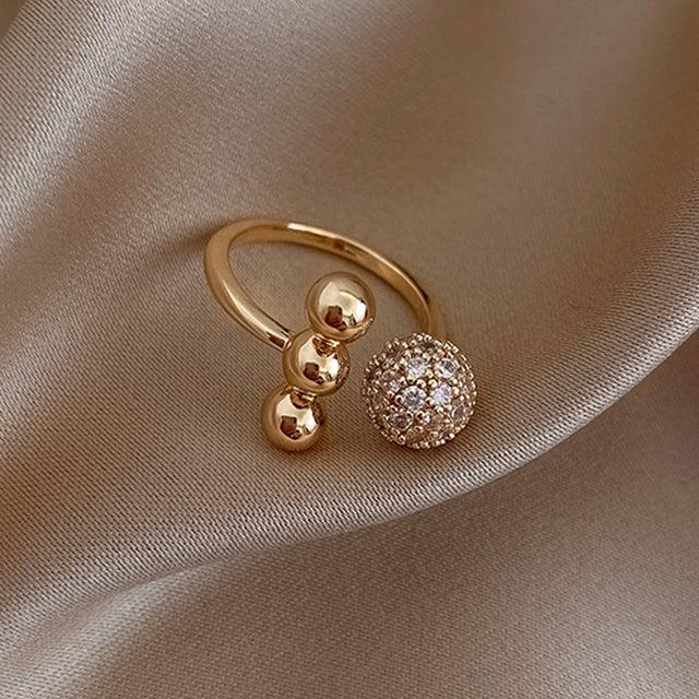 Triple Ball Ring Made of Gold and Zirconium Dioxide