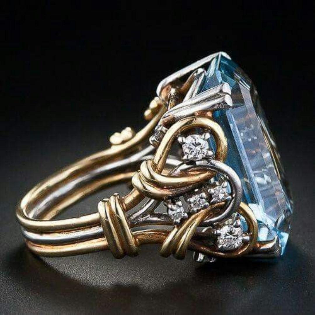 Gold Ring with Blue Zircon in Vintage Style