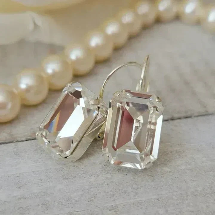 Vintage Earrings Made of White Glass