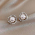 Shiny Spiral Earrings with Elegant Pearls