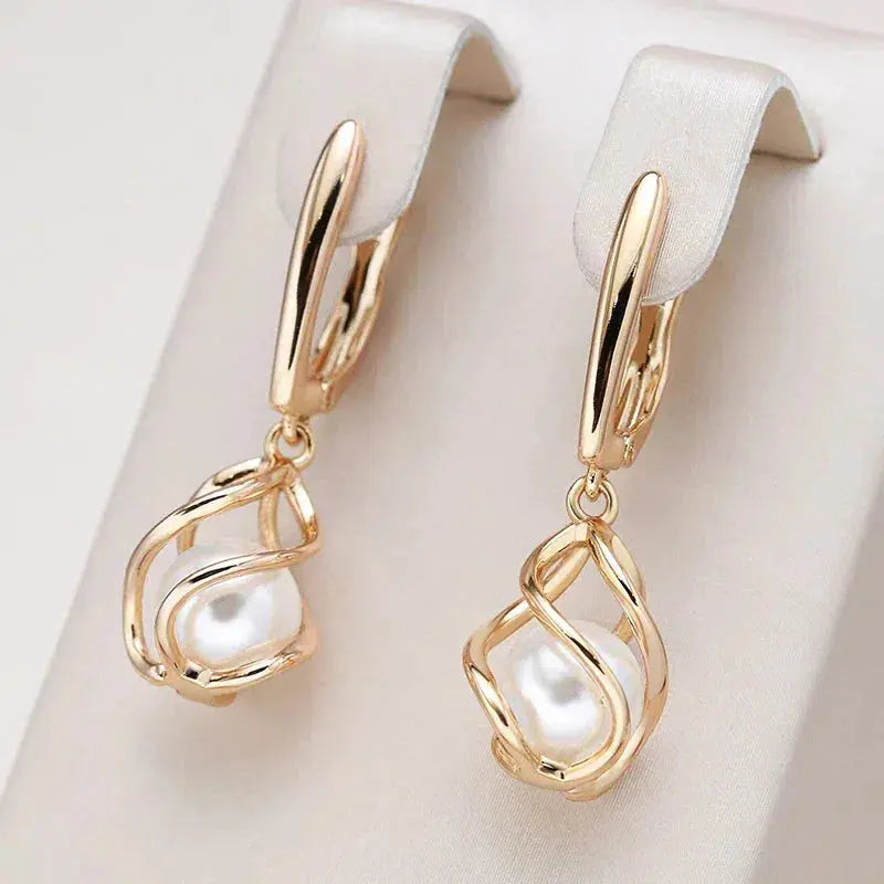 1+1 Offer: Elegant Gold Pearl Earrings + Vintage Gold Ring with a Fancy Pearl