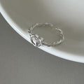 Delicate Silver Ring with Heart Detail