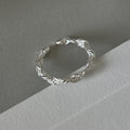 Braided Silver Ring with Intricate Design