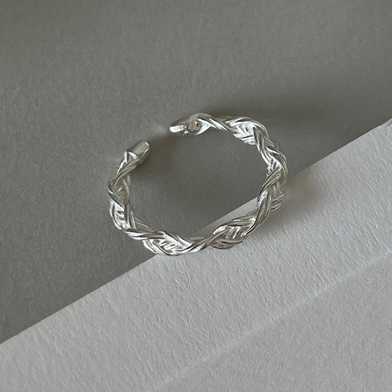 Braided Silver Ring with Intricate Design