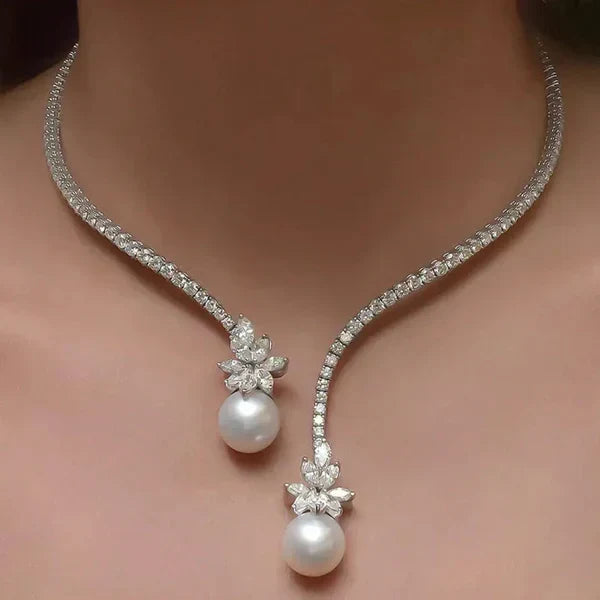 1+1 Offer: Elegant Shiny Necklace with Pearls Made of Silver + Emerald Cut White Sapphire Bracelet