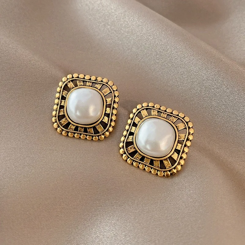 Gold-Plated Earrings with Inlaid Pearls