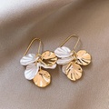 Elegant Earrings Made of White and Golden Petals