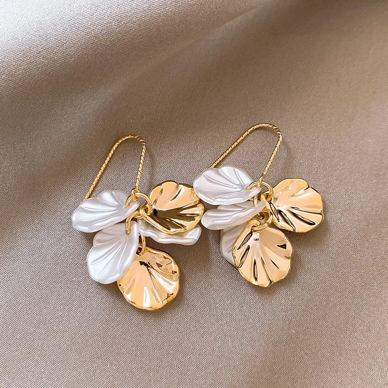 Elegant Earrings Made of White and Golden Petals
