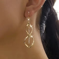 Dangling Spiral Gold Earrings