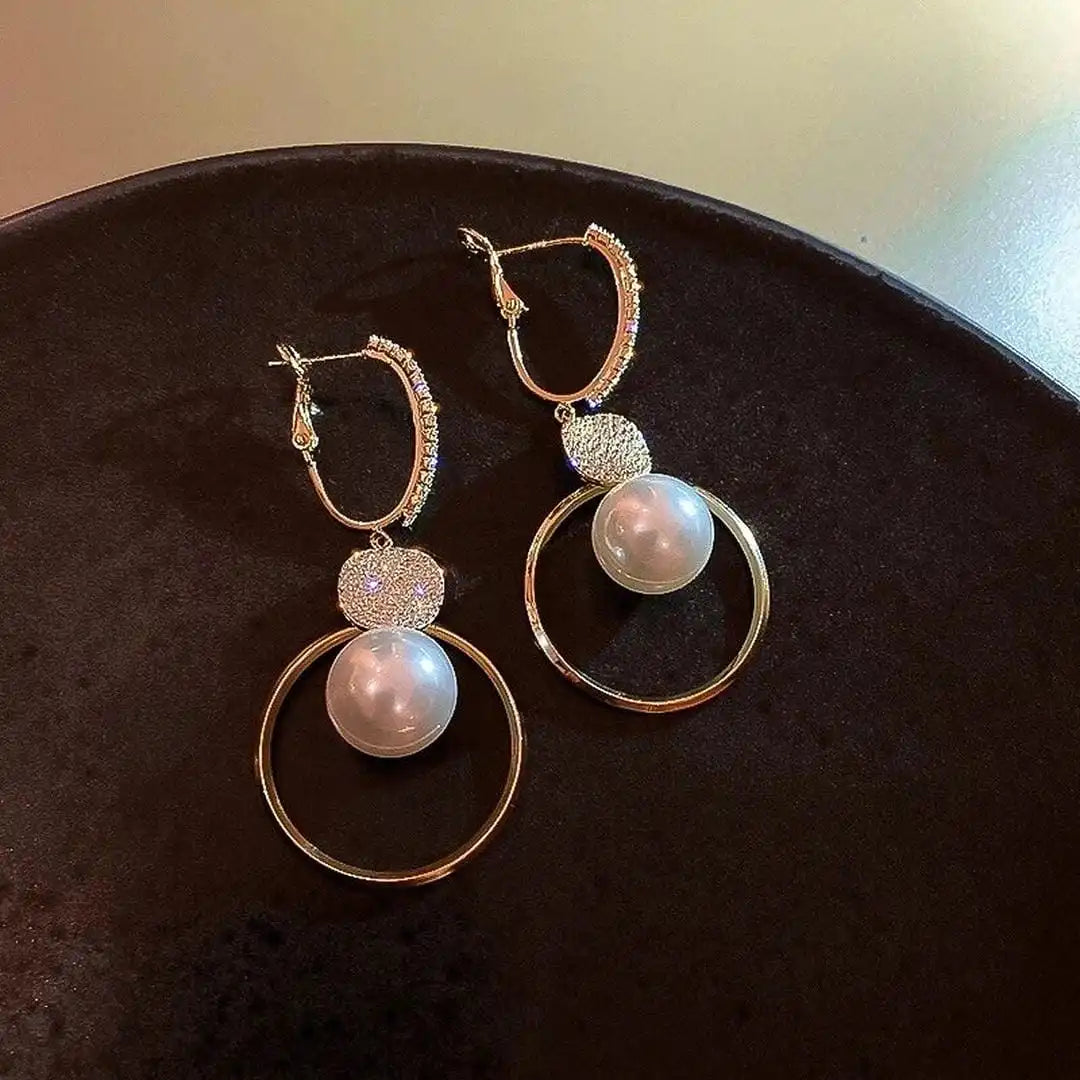 Earrings With Cultured Pearls And Embezzled Balls